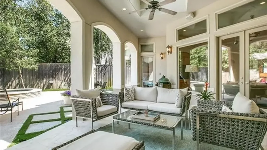 Naples Rear Patio Covered outdoor living patio overlooking the swimming pool at the Naples house plan.