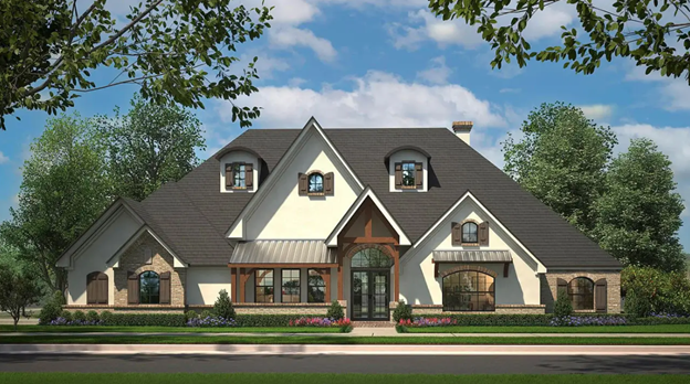 French Country style home exterior with stone accents and steep gable